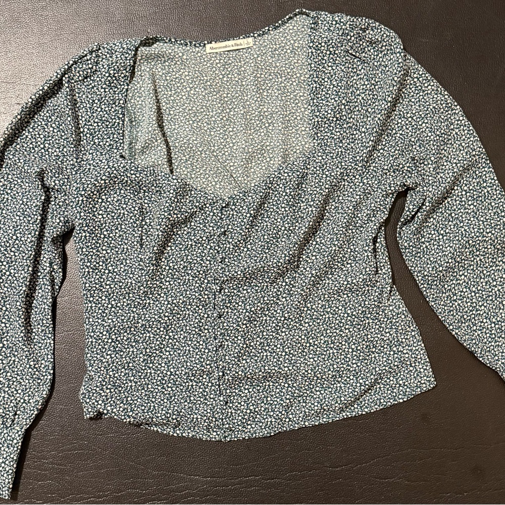Green and white blouse